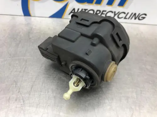 Koplampmotor-7743826